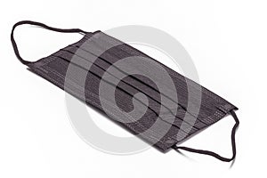 Close up black surgical mask isolate on white background.