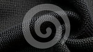 Close-up of Black Textured Fabric with Intricate Pattern