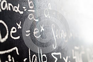 Close up of blackboard full of math equation