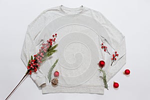 Close up blank template shirt, gray sweatshirt hoodie with copy space and Christmas Holiday concept. Top view mockup sweater