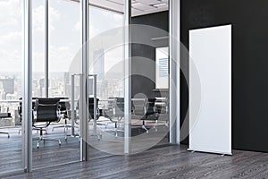 Close up of blank white roll up in modern office, 3d rendering