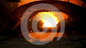 Close up for blast furnace and hot molten steel being poured into the chute, heavy industry concept. Stock footage