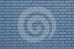 Close up of a blue brick wall