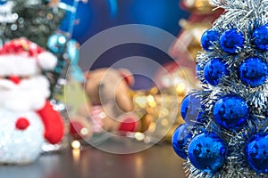 Close-up of blue christmas tree, and Christmas holiday background concept with toys, decorations, ornaments