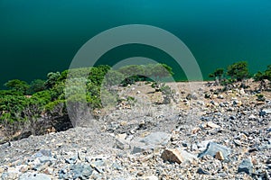 Close-up of a blue dam lake among green mountains in GÃ¶kceada,