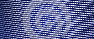 Close-up of a blue digital background featuring a pattern of binary code, representing technology and data processing in