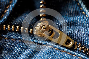 Close up blue jeans zipper.