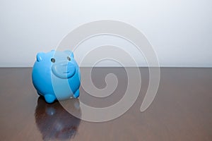 Close-up of blue  piggybank.Business and finance concept