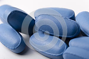 close up of blue pills or tablets