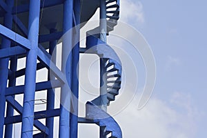 Close up of Blue Spiral Staircase on Elevated Water Tank