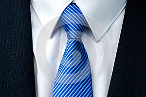 Close-up of a blue striped tie