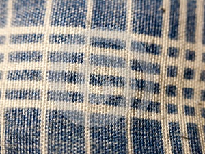 Close up of blue and white striped table cloth pattern