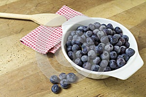 Close-up of blueberries on wooden table