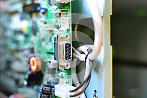 Close-up of Blurred background - Printed Circuit Board with electrical components. Concept for electrical engineering and modern