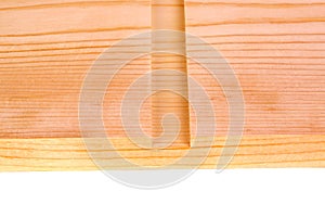 Close-up of a board with a woodworking dado groove isolated photo