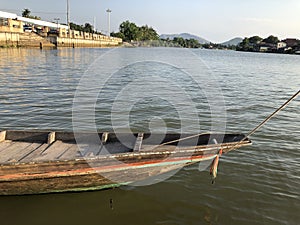 Close up of boat mooring at dock against sky