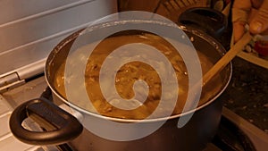 Close up of Boiling Gravy Sauce being stirred