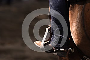 Close-up of Booted Foot in a Stirrup