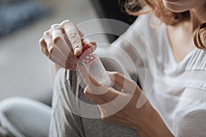 Close up of a bottle with pills