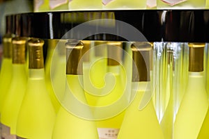 Close-up of bottles of osmanthus wine on the wine cabinet