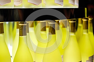 Close-up of bottles of osmanthus wine on the wine cabinet