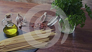 Close-up from bottom to top of the typical italian recipe spaghetti aglio olio e peperoncino garlic, oil and hot pepper