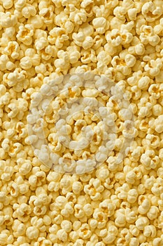 Close-up of a Bountiful Pile of Buttery Popcorn Kernels
