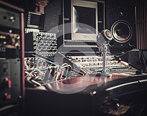 Close-up of boutique recording studio control desk.