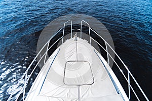 Close-up of the bow of the yacht. Modern yachts in the sea