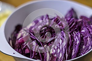 Close-up of a bowl with chopped red cabbage