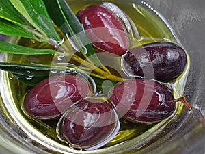 Close up, bowl of kalamon olives in oil