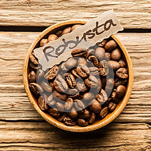Close up of a bowl of Robusta coffee beans