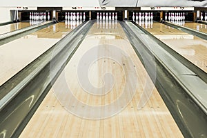 Close up of bowling pins in a row