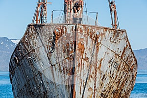 Close-up of bows of old rusting whaler photo