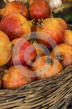 Close-up of box with many Italian pomegranates in fair