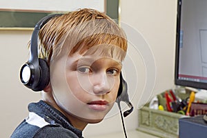 Close-up of Boy Playing Video Games on Computer