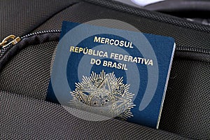 Close up of Brazil Passport in Black Suitcase Pocket