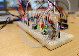 A Close-Up of Breadboard Electronics Prototyping with Potentiometer