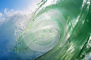 Close-up of a breaking Ocean Wave on the Beach