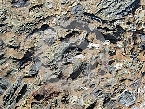 Close up of breccci or angular rock conglomerate. photo