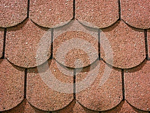 Close up with brick red roof tiles. roof seamless pattern