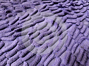 Close-up of Bright Purple Microfiber Carpet Texture