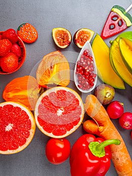 Close up of bright red, orange healthy fruits and vegetables products for Immunity boosting, rich in vitamins and