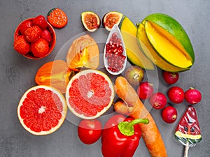 Close up of bright red, orange healthy fruits and vegetables products for Immunity boosting, rich in vitamins and antioxidants,