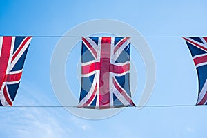 Close up of British flags flying in Regent Street London to celebrate the Royal Wedding of Prince Harry to Meghan Markle.