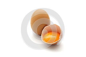 Close up broken egg isolated on white background