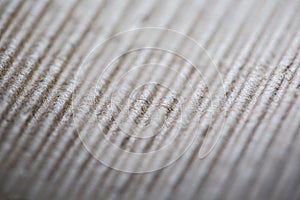 Close up of brown cardboard texture. Seamless carton background
