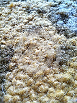 Close up of a brown carpet/ alfombra cafÃÂ© magnificada photo