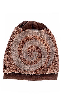 Close up of brown colored hand wooled  woolen cap isolated on white