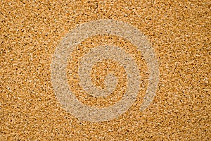 Close-up of brown cork board texture background. Empty bulletin board, natural texture